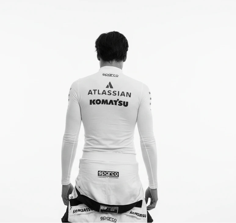 Close-up detail of Carlos Sainz number 55 sublimated printing on white Lycra compression shirt