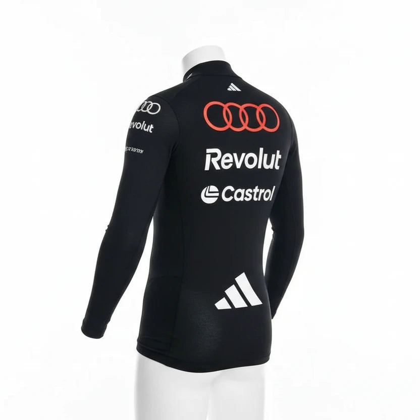 Close-up detail of driver number 27 and number 5 sublimated graphics on Audi F1 Lycra shirt